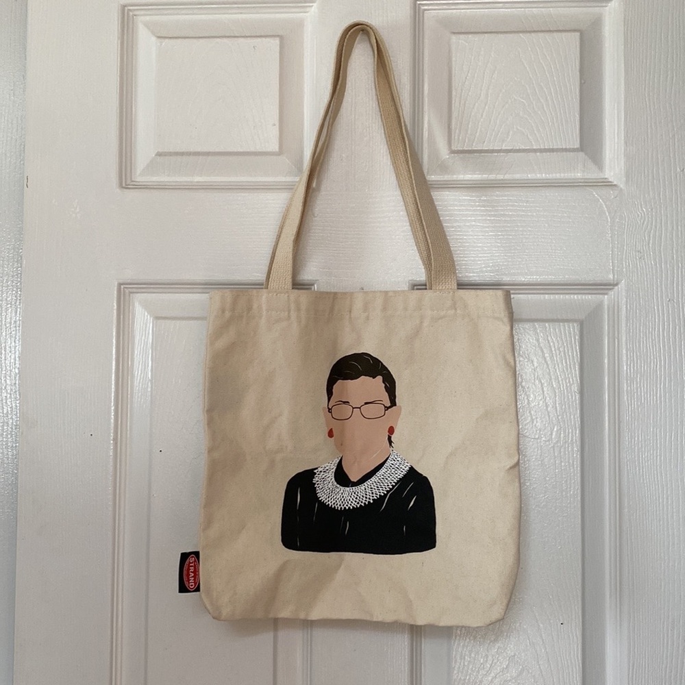 The Strand Icon RBG Time is one the side of CHANGE Tote Bag - Picture 3 of 10